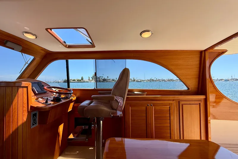 Slide: The Image of Luxurious interior of 2002 Palm Beach Motor Yachts Avalon 38 with scenic water view. - 22