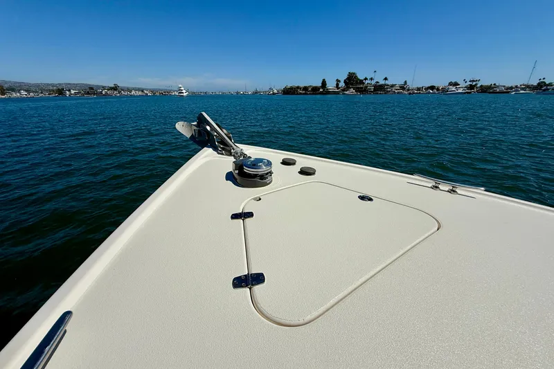 Slide: The Image of Bow view of 2002 Palm Beach Motor Yachts Avalon 38 on calm waters. - 27