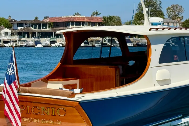 Slide: The Image of 2002 Palm Beach Motor Yachts Avalon 38 docked in Newport Beach, featuring elegant design. - 32