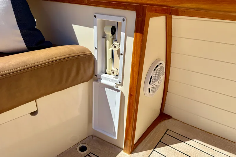 Slide: The Image of Interior detail of 2002 Palm Beach Motor Yachts Avalon 38, featuring seating and speaker. - 34