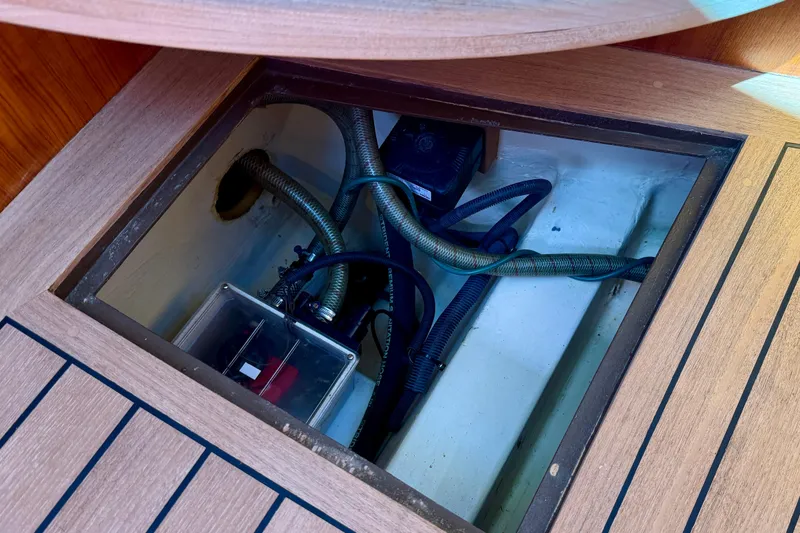 Slide: The Image of Open hatch in 2002 Palm Beach Avalon 38 yacht showing internal wiring and components. - 41