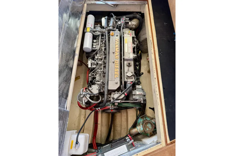 Slide: The Image of Engine compartment of 2002 Palm Beach Motor Yachts Avalon 38 with Yanmar diesel engine. - 42