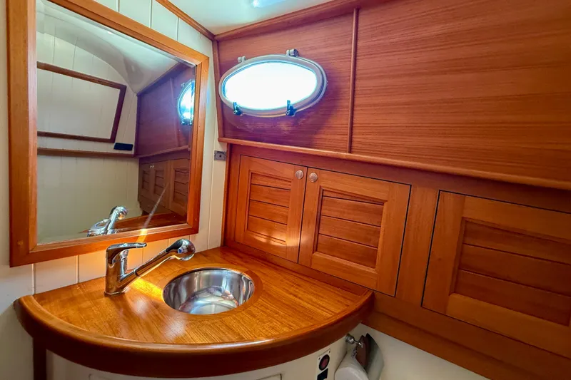 Slide: The Image of Luxurious wooden bathroom interior of 2002 Palm Beach Motor Yachts Avalon 38. - 8