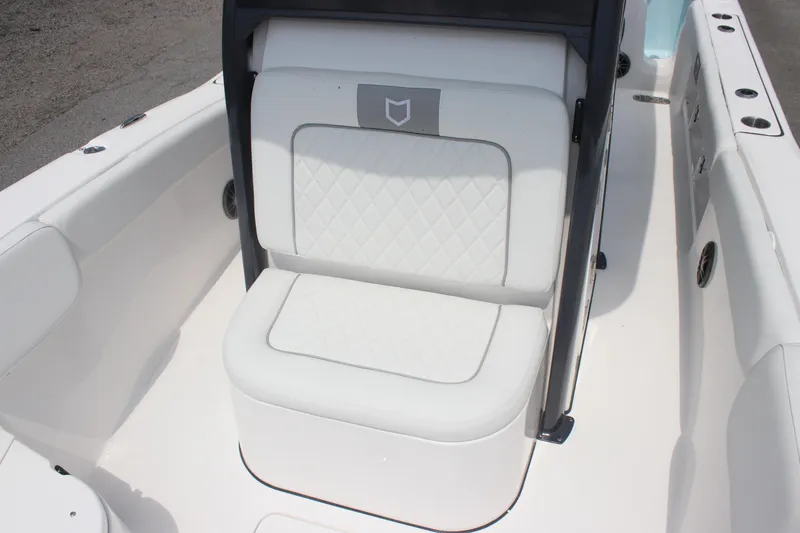 Slide: The Image of 2026 Sea Fox 248 Commander boat seat with quilted white upholstery. - 13