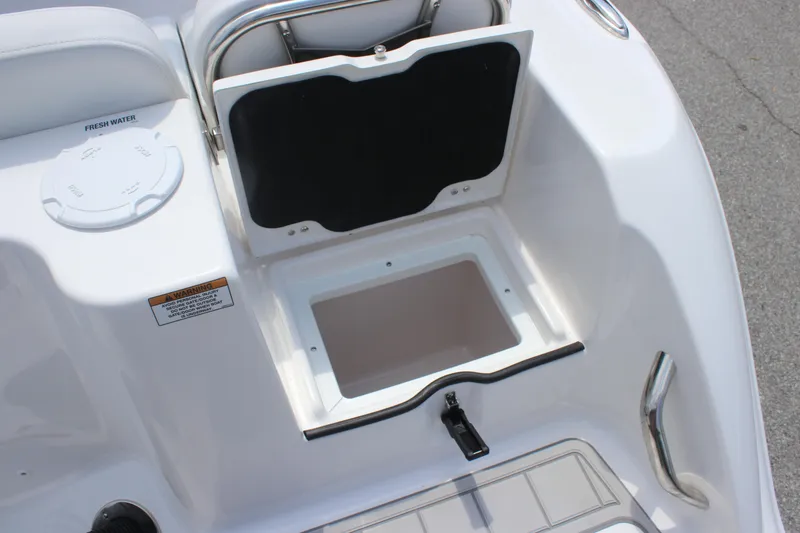 Slide: The Image of 2026 Sea Fox 248 Commander boat storage compartment with fresh water access. - 29