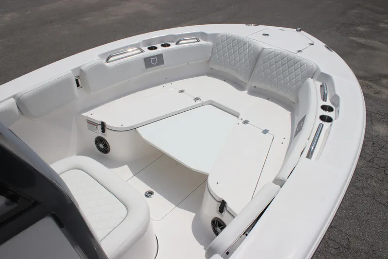 Slide: The Image of 2026 Sea Fox 248 Commander boat interior with white seating and table. - 4