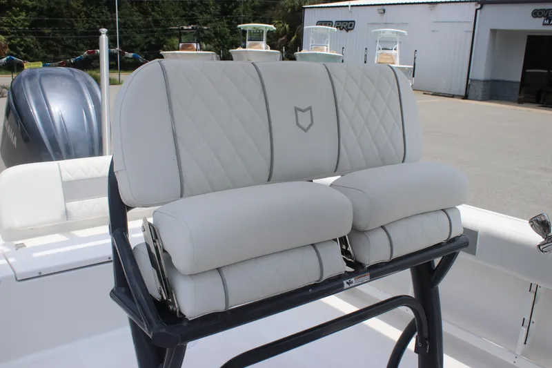 Slide: The Image of 2026 Sea Fox 248 Commander boat with luxurious white seating and Yamaha engine. - 7