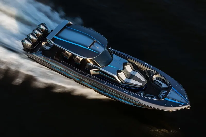 Slide: The Image of Aerial view of sleek 2026 MTI V422 speedboat cruising on water. - 2