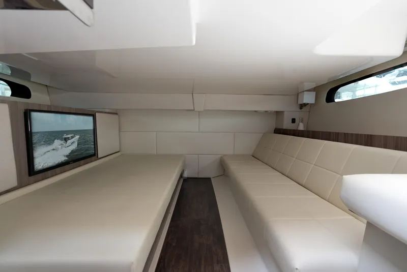 Slide: The Image of Luxurious interior of 2022 Regal 36 XO yacht with plush seating and modern design. - 4