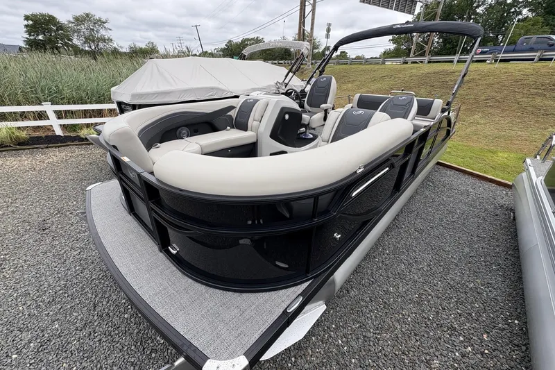 Slide: The Image of 2026 Barletta C22UC pontoon boat with sleek design and comfortable seating. - 3