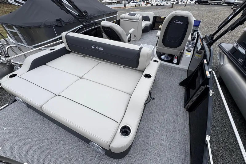 Slide: The Image of 2026 Barletta C22UC pontoon boat with spacious seating and modern design. - 8