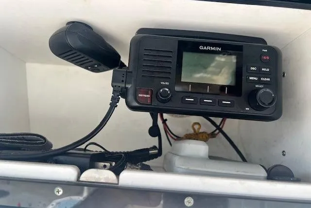 Slide: The Image of Garmin VHF radio installed in a 2018 Key West 263 FS boat console. - 10