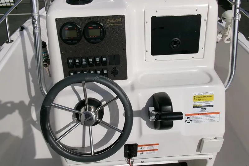 Slide: The Image of 2005 Seaswirl 1851 CC O/B boat console with steering wheel and control panel. - 11