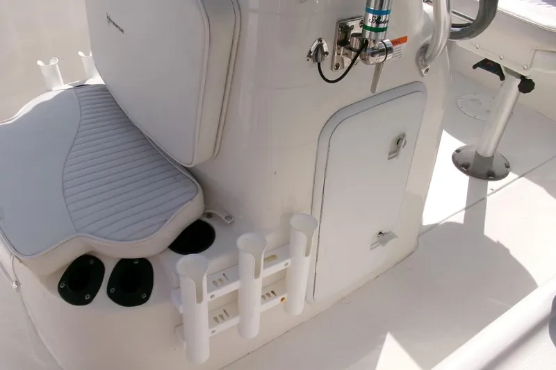 Slide: The Image of 2005 Seaswirl 1851 CC O/B boat interior with seating and storage compartments. - 15