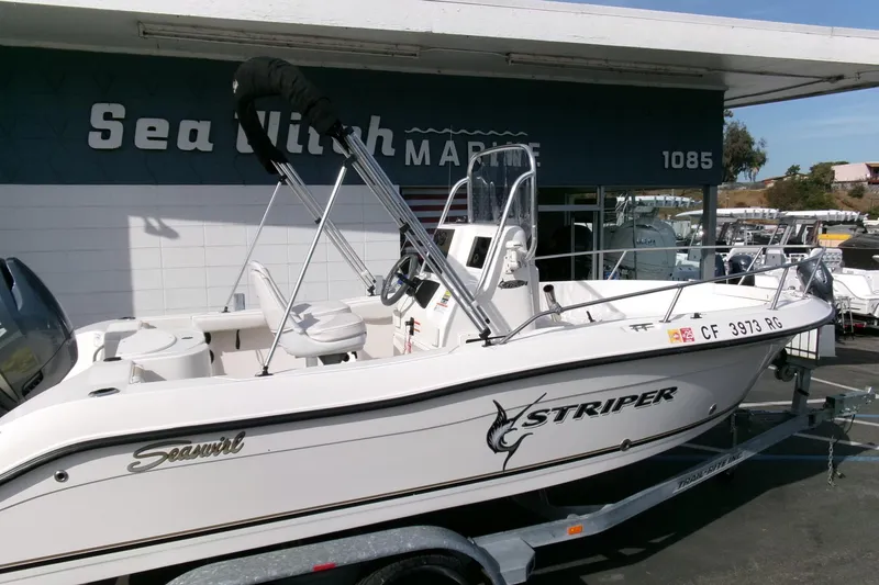Slide: The Image of 2005 Seaswirl 1851 CC O/B boat on trailer at Sea Witch Marine dealership. - 23