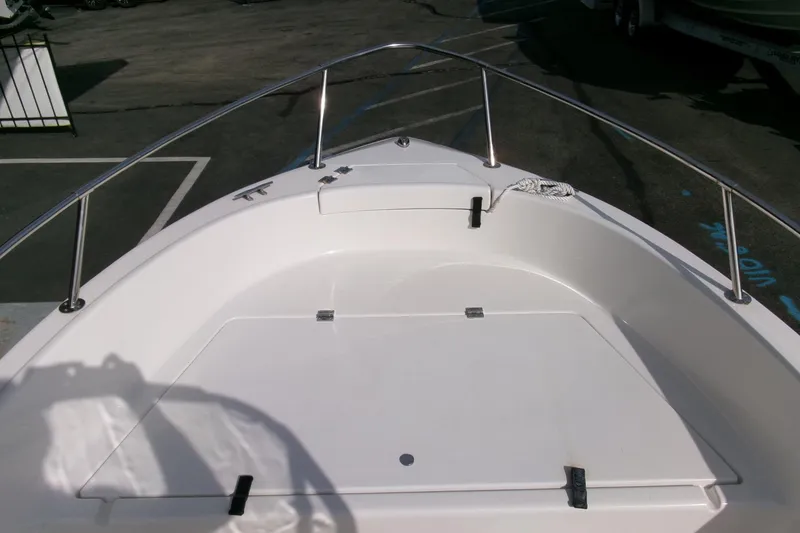 Slide: The Image of 2005 Seaswirl 1851 CC O/B boat deck with stainless steel railings. - 6