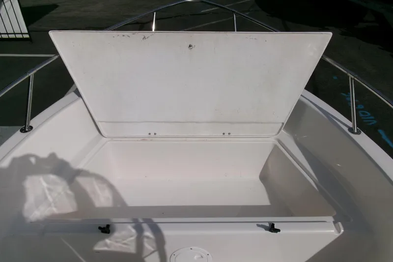 Slide: The Image of 2005 Seaswirl 1851 CC O/B boat storage compartment with open hatch. - 7