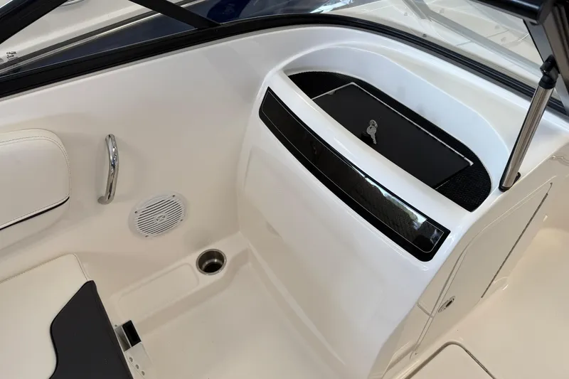 Slide: The Image of 2025 Bayliner VR4 Bowrider OB interior detail with sleek white design and modern features. - 7