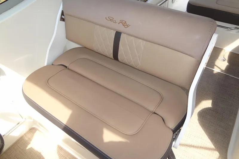 Slide: The Image of 2017 Sea Ray Sundancer 280 boat seat with beige leather upholstery and embroidered logo. - 19