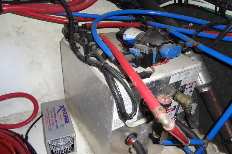 Slide: The Image of Engine compartment of 2017 Sea Ray Sundancer 280 with wiring and components. - 46