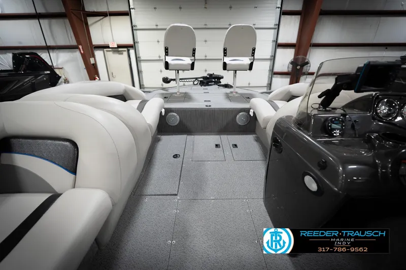 Slide: The Image of Interior of a 2022 Flowers SD224 boat with seating and control panel. - 15