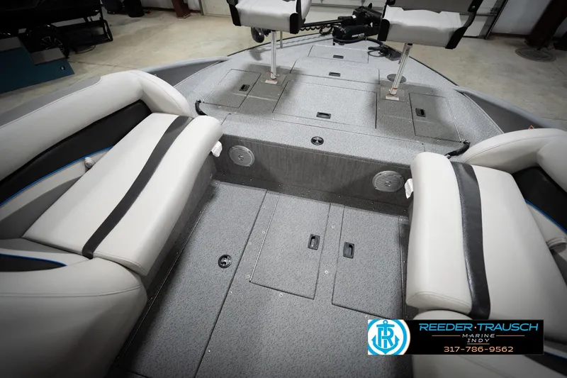 Slide: The Image of Interior of a 2022 Flowers SD224 boat with seating and storage compartments. - 24