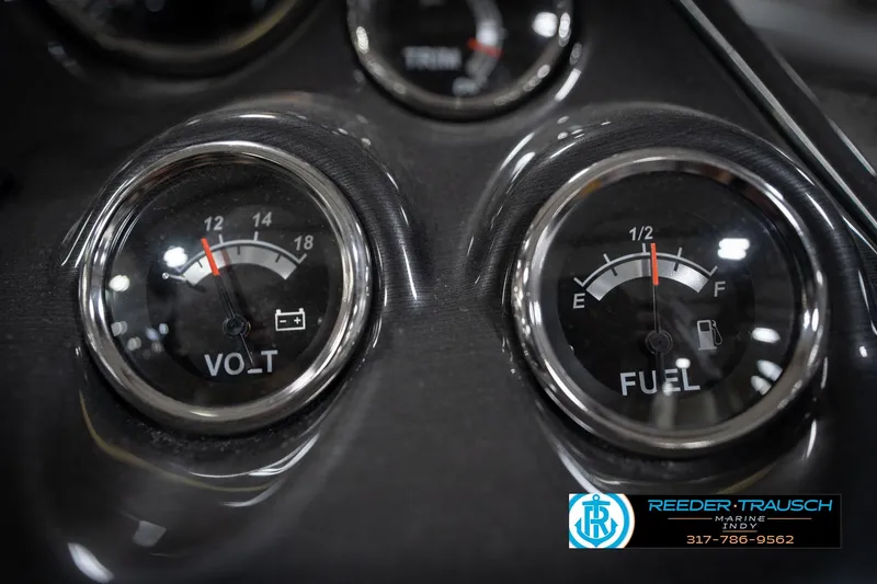 Slide: The Image of Close-up of volt and fuel gauges on a Flowers SD224, 2022 model dashboard. - 39