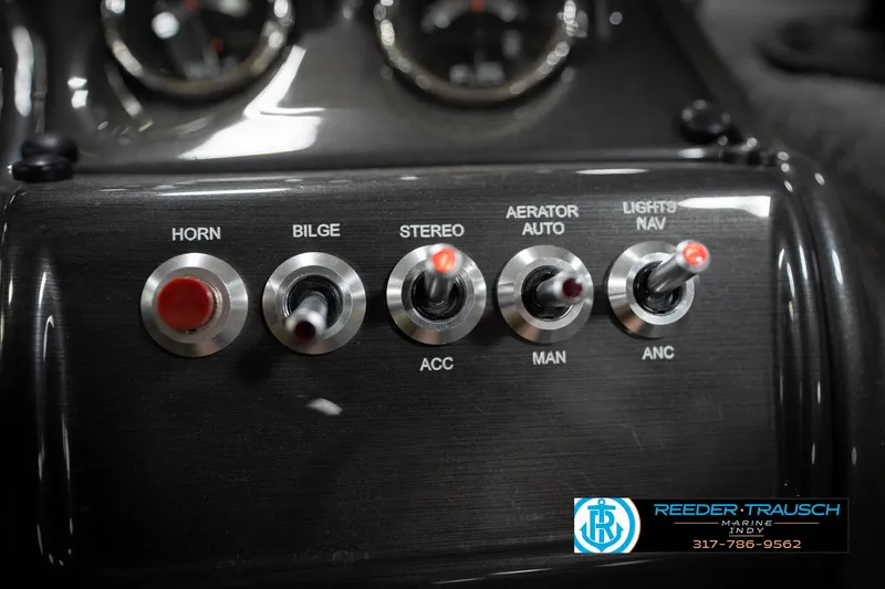 Slide: The Image of Control panel with switches for horn, bilge, stereo, aerator, and navigation lights. - 40