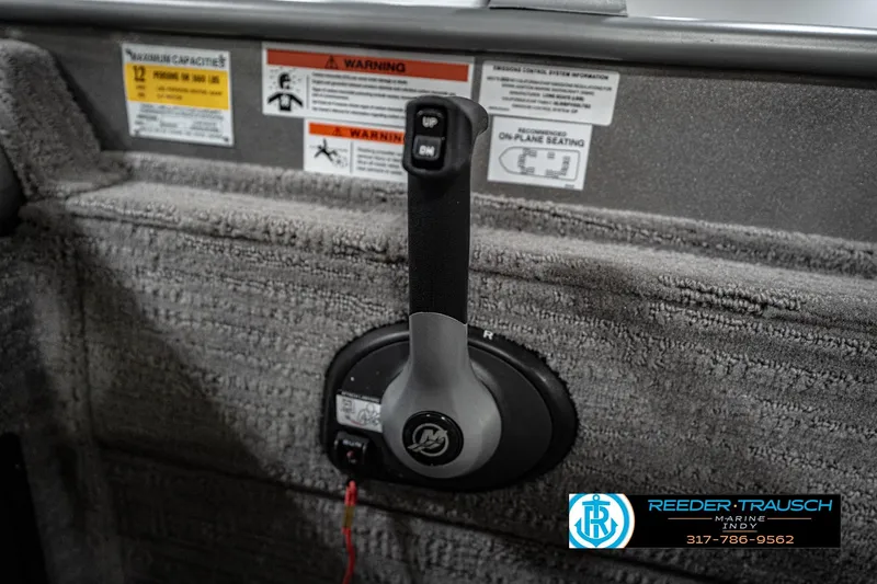 Slide: The Image of Boat throttle control with warning labels, featuring Reeder-Trausch Marine logo. - 41