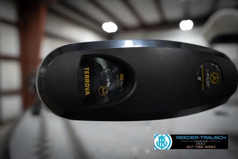 Slide: The Image of Close-up of Terrova i-Pilot trolling motor with Reeder Trausch Marine logo. - 50