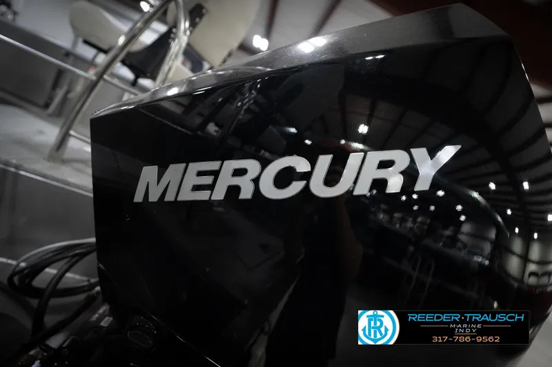 Slide: The Image of Close-up of a Mercury outboard motor at Reeder-Trausch Marine showroom. - 54