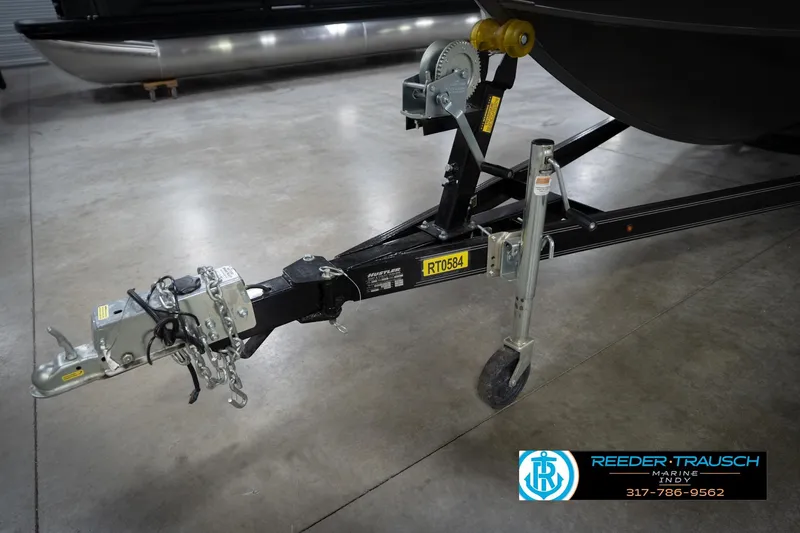 Slide: The Image of Trailer hitch and winch system on a Flowers SD224, 2022 model, in a showroom. - 60