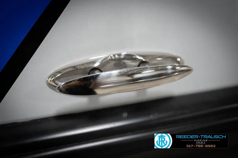 Slide: The Image of Close-up of a metallic boat cleat on a Flowers SD224, 2022 model. - 64