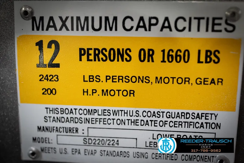 Slide: The Image of Boat capacity label: 12 persons or 1660 lbs, model SD224, 2022 compliance. - 65