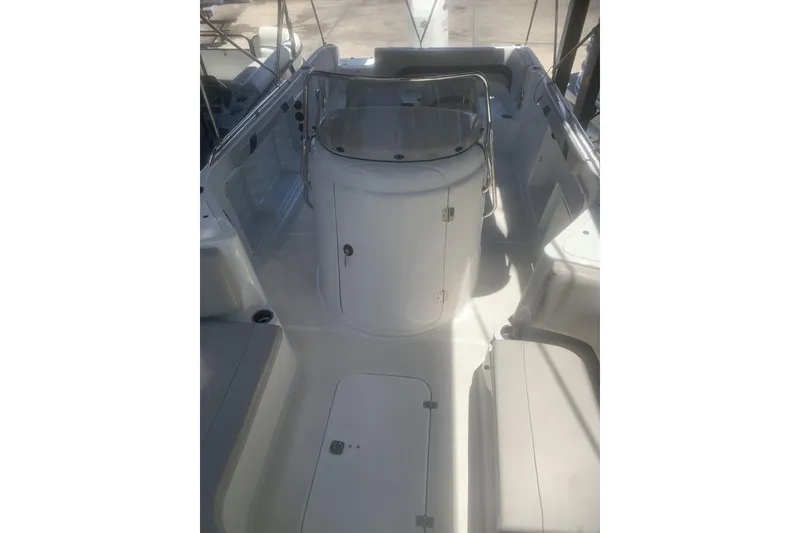 Slide: The Image of 2024 Hurricane CC231 boat interior with seating and console. - 9