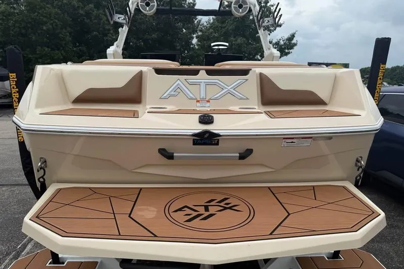 Slide: The Image of 2024 ATX Surf Boats 24 Type-S, rear view with branded swim platform. - 7