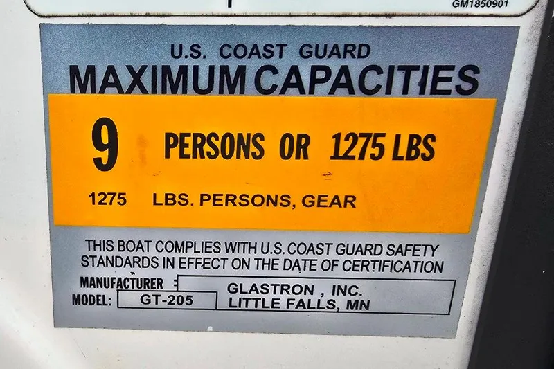 Slide: The Image of 2008 Glastron GT205 BR boat capacity label: 9 persons or 1275 lbs maximum. - 15