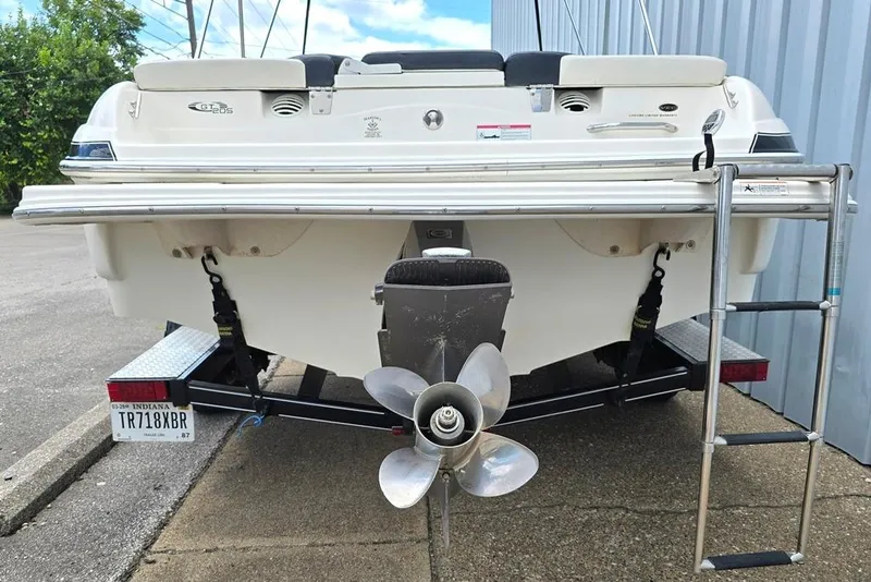 Slide: The Image of 2008 Glastron GT205 BR boat rear view with propeller and ladder. - 9