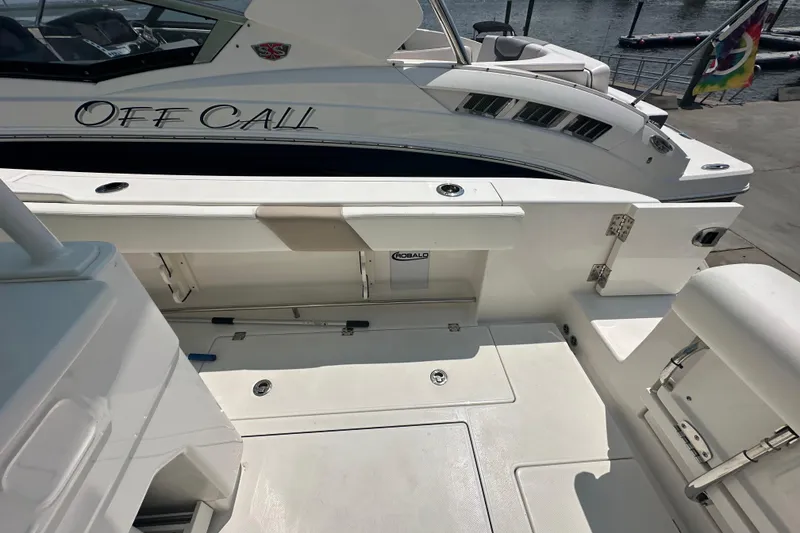 Slide: The Image of 2023 Robalo R302 Center Console boat deck, featuring sleek design and spacious layout. - 9