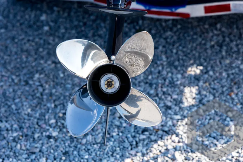 Slide: The Image of Close-up of a shiny boat propeller on gravel, Pathfinder 2200 TRS, 2026 model. - 19