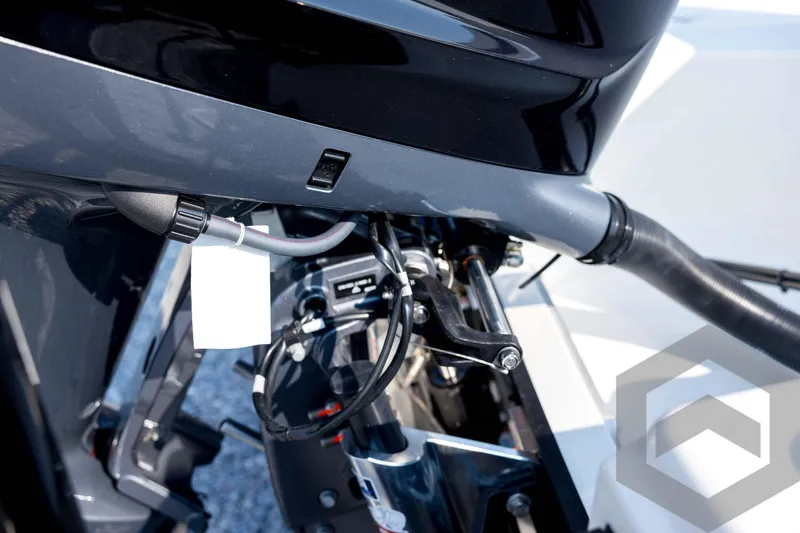 Slide: The Image of Close-up of 2026 Pathfinder 2200 TRS boat engine components and connections. - 25