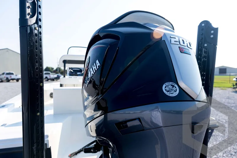 Slide: The Image of 2026 Pathfinder 2200 TRS boat with Yamaha 200 engine, showcasing sleek design and power. - 27