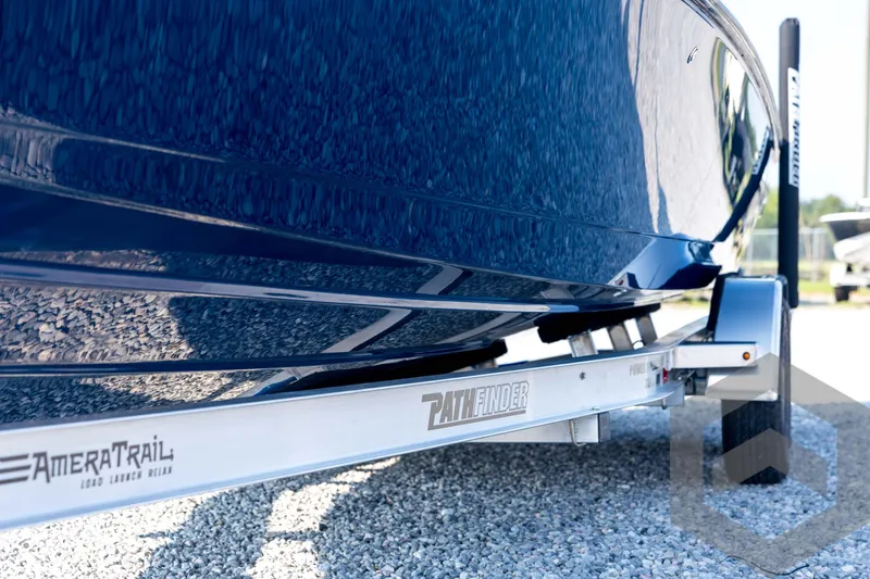 Slide: The Image of 2026 Pathfinder 2200 TRS boat on AmeraTrail trailer, close-up view. - 34