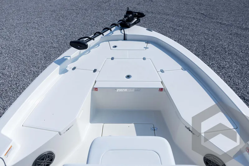 Slide: The Image of 2026 Pathfinder 2200 TRS boat deck with storage compartments and trolling motor. - 37
