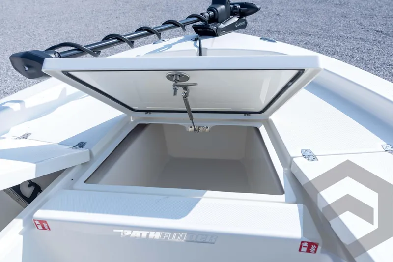 Slide: The Image of Open storage compartment on 2026 Pathfinder 2200 TRS boat, showcasing spacious interior. - 42