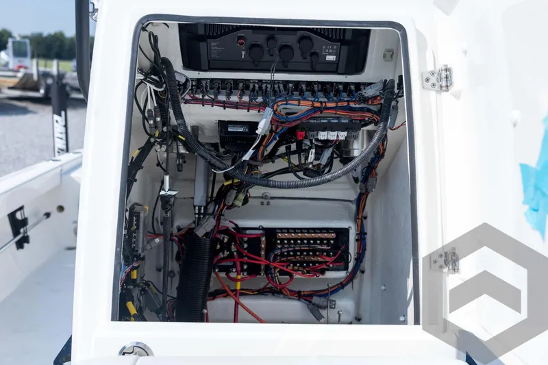 Slide: The Image of 2026 Pathfinder 2200 TRS boat wiring and control panel interior view. - 48