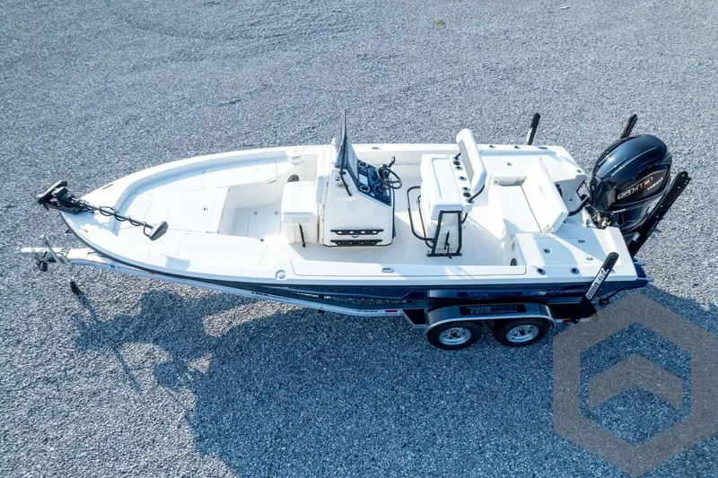 Slide: The Image of 2026 Pathfinder 2200 TRS boat on trailer, aerial view, parked on gravel surface. - 80