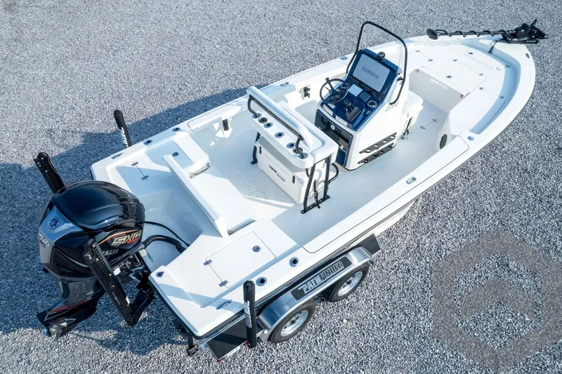 Slide: The Image of 2026 Pathfinder 2200 TRS boat on trailer, featuring Yamaha engine and Garmin navigation system. - 85