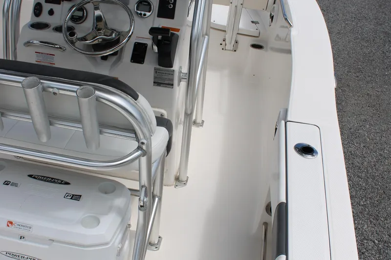 Slide: The Image of 2018 Robalo R200 Center Console boat interior with steering wheel and seating. - 17