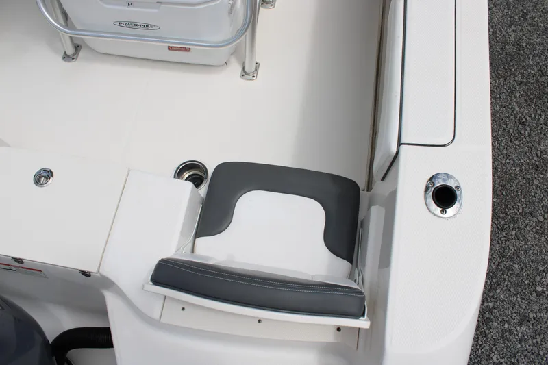 Slide: The Image of 2018 Robalo R200 Center Console boat interior with seating and rod holder. - 21
